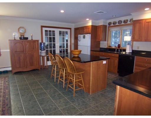 11 Georgianna Road Billerica, MA 01821 - Photo 12 of 29 a living room with furniture a ceiling fan and a window
