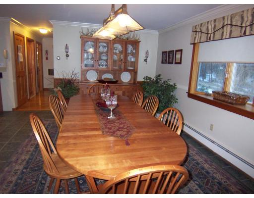 11 Georgianna Road Billerica, MA 01821 - Photo 14 of 29 a view of a dining room with furniture and chandelier