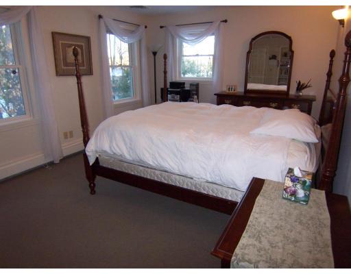 11 Georgianna Road Billerica, MA 01821 - Photo 25 of 29 a bedroom with a bed and window