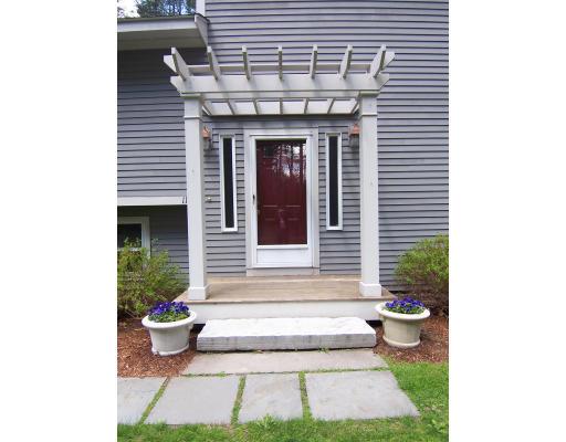 11 Georgianna Road Billerica, MA 01821 - Photo 6 of 29 a front view of a house with garden and porch