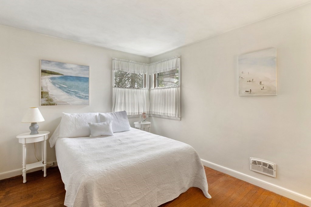 19 Laconia Road Natick, MA 01760 - Photo 14 of 27 a bedroom with a bed and a window