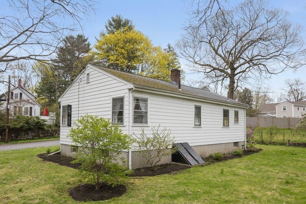 19 Laconia Road Natick, MA 01760 - Photo 21 of 27 a view of a house with a yard