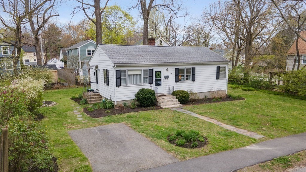 19 Laconia Road Natick, MA 01760 - Photo 3 of 27 front view of a house with a yard