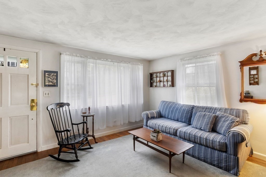 19 Laconia Road Natick, MA 01760 - Photo 6 of 27 a living room with furniture