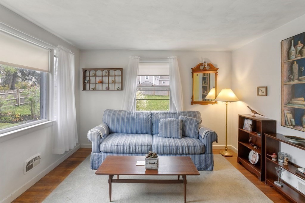19 Laconia Road Natick, MA 01760 - Photo 7 of 27 a living room with furniture and a window