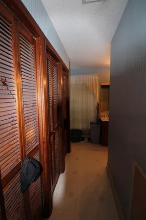 a bathroom with a sink double vanity and a mirror