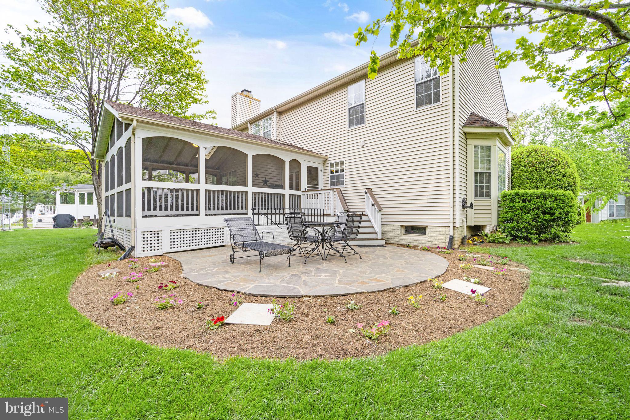 14735 Pickets Post Road Centreville, VA 20121 - Photo 60 of 69 Stone patio with screen room access.