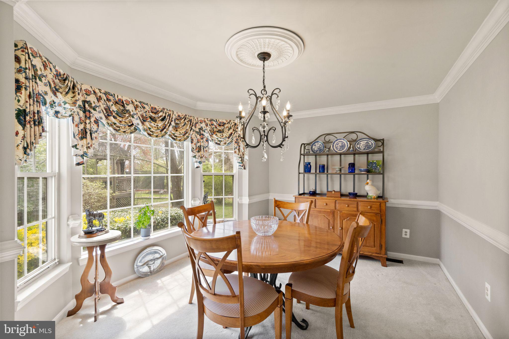 14735 Pickets Post Road Centreville, VA 20121 - Photo 10 of 69 Formal dining room with large, bay window.