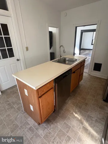 a view of empty room with windows