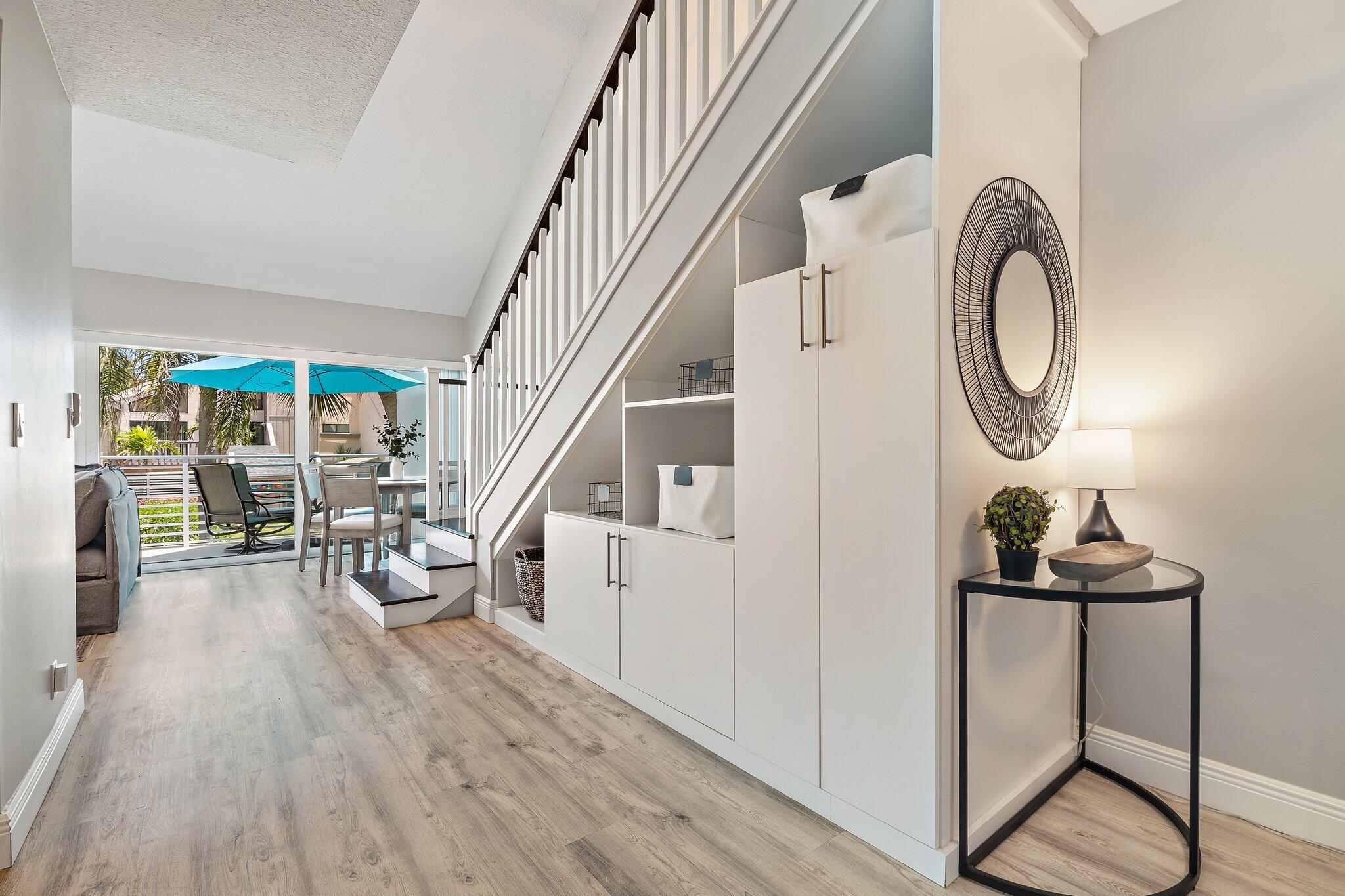 1605 Highway 1, Unit 209M2 Jupiter, FL 33477 - Photo 2 of 26 a very nice looking living room with a large window and wooden floor