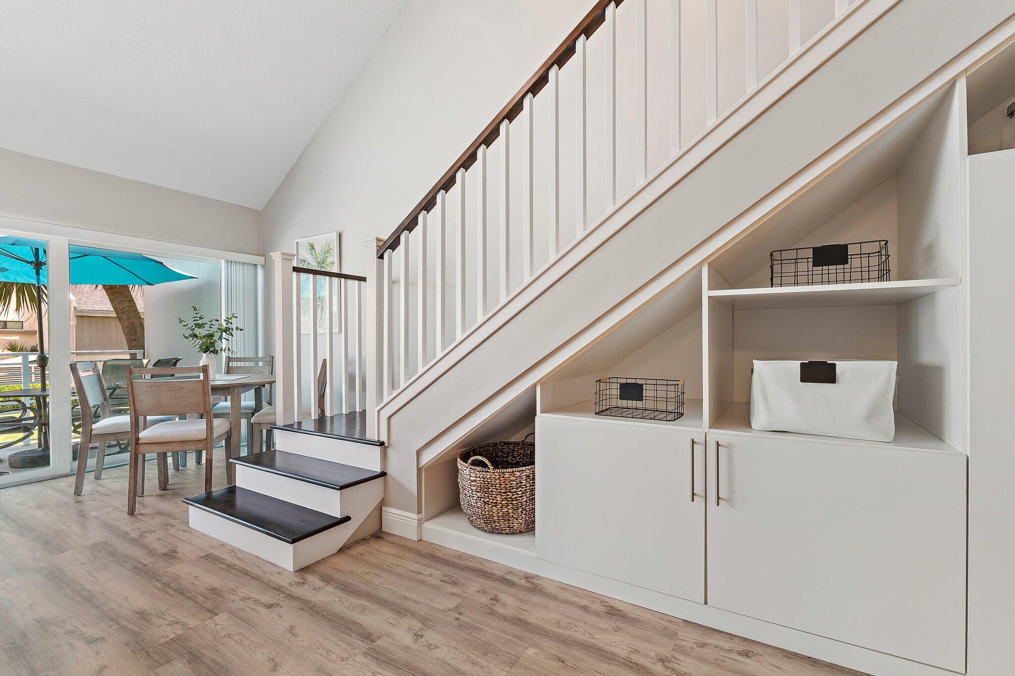 1605 Highway 1, Unit 209M2 Jupiter, FL 33477 - Photo 3 of 26 a view of entryway and hall with wooden floor