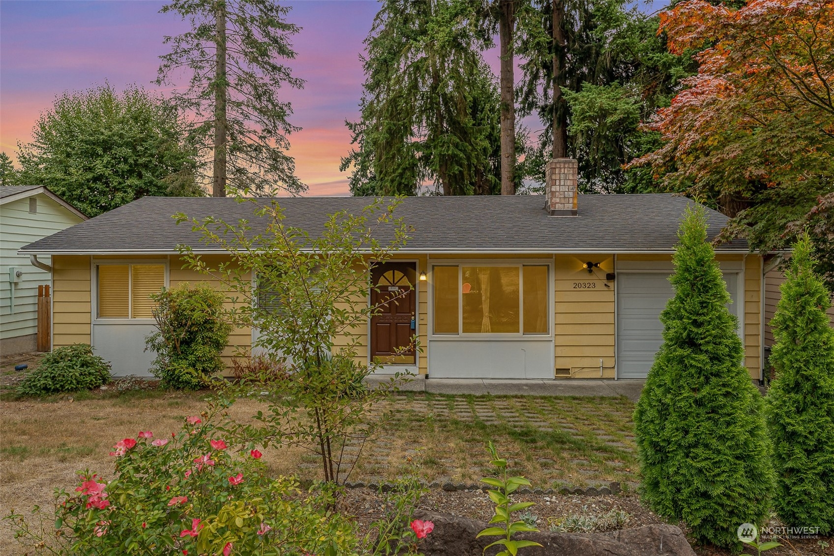 20323 12th Drive Southeast Bothell, WA 98012 - Photo 1 of 10 a view of a house with a yard and potted plants