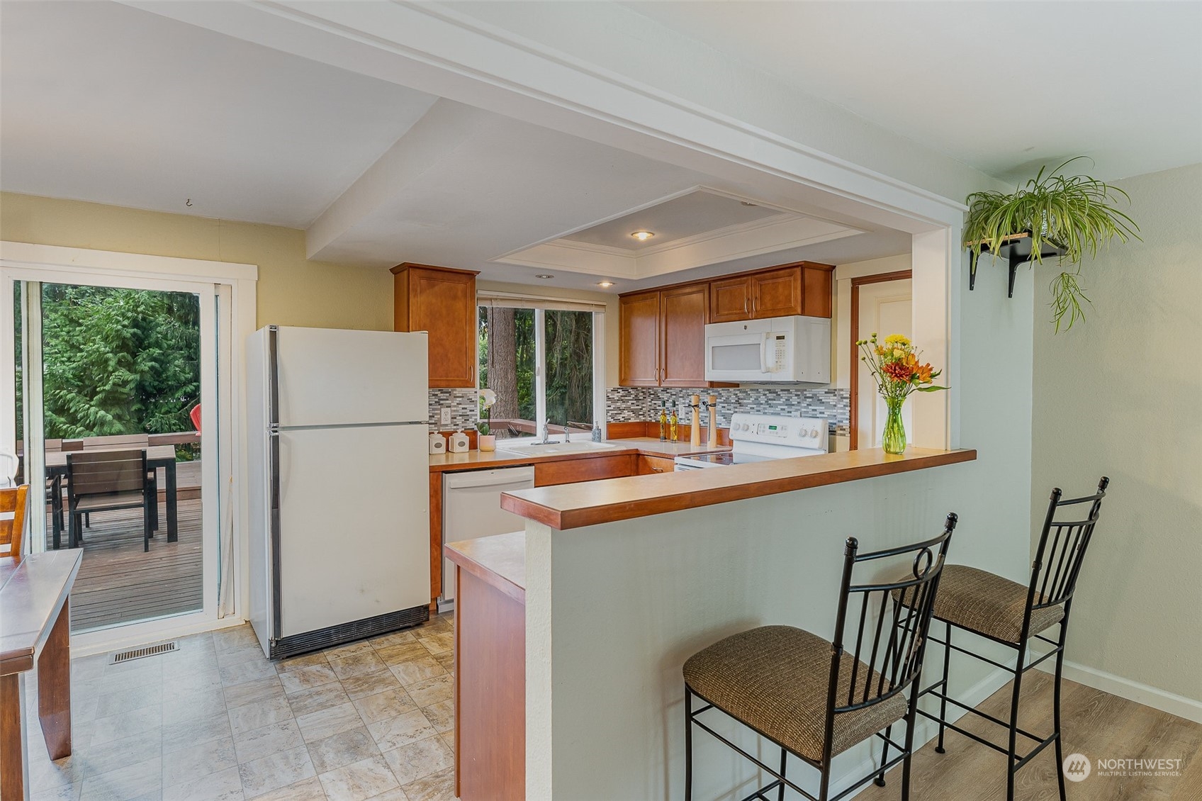 20323 12th Drive Southeast Bothell, WA 98012 - Photo 3 of 10 a kitchen with refrigerator and cabinets