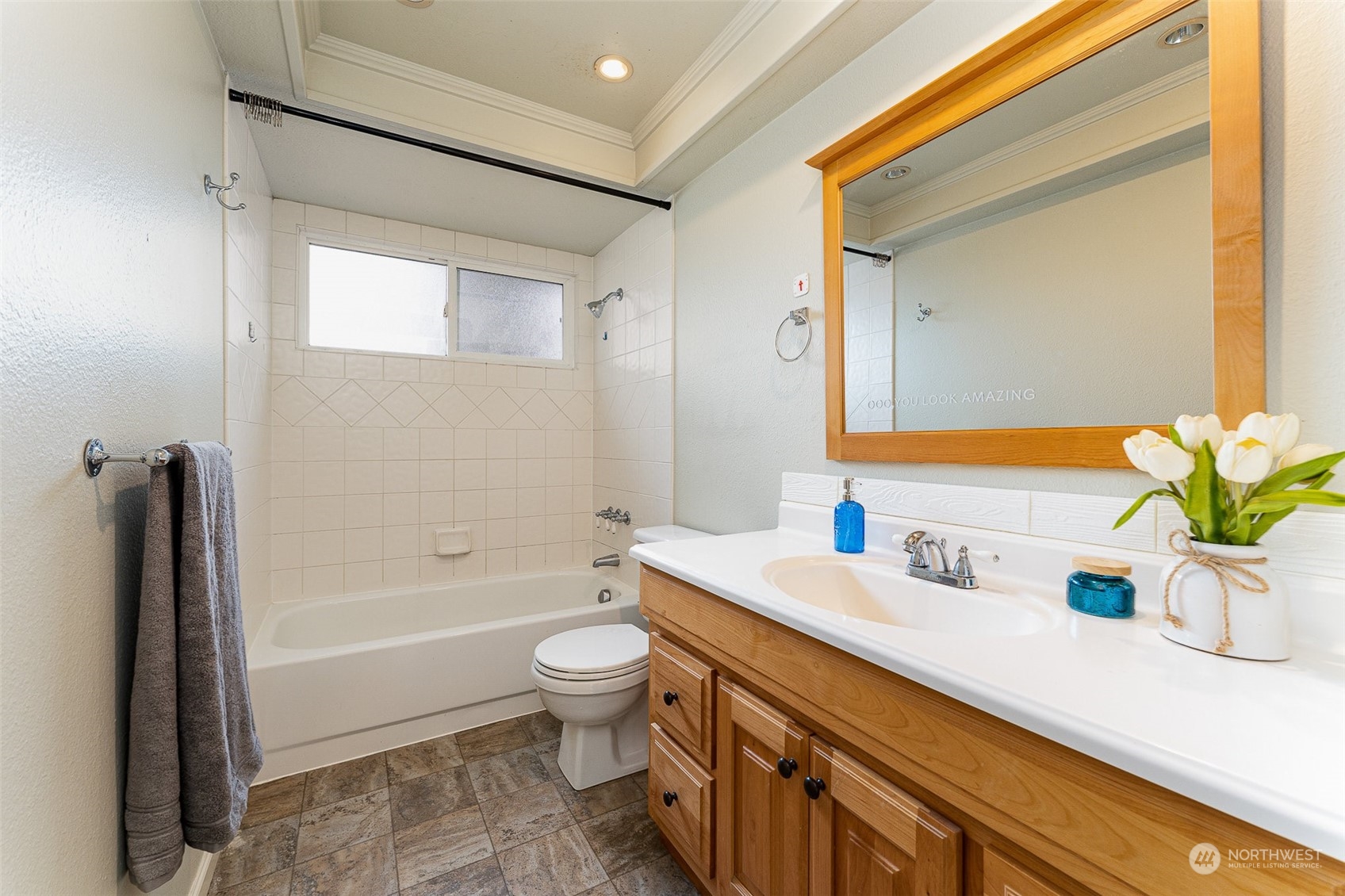 20323 12th Drive Southeast Bothell, WA 98012 - Photo 8 of 10 a bathroom with a sink a toilet and bathtub