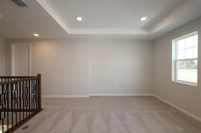 en empty room with windows