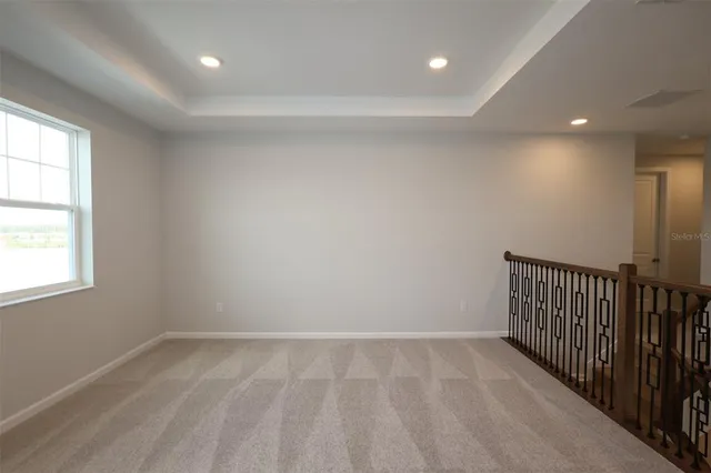 en empty room with windows