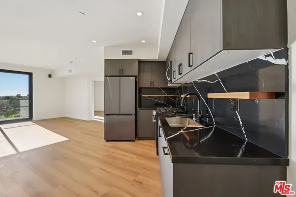 $7,042 | 1110 South Spaulding Avenue, Unit PH6, Los Angeles, CA 90019