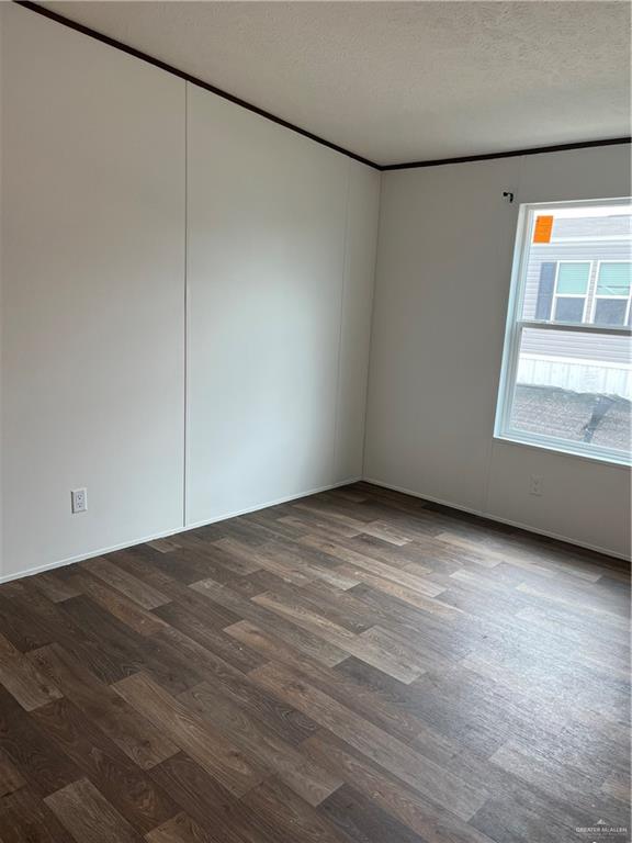 210 Risueno Avenue Donna, TX 78537 - Photo 31 of 32 a view of an empty room with a window