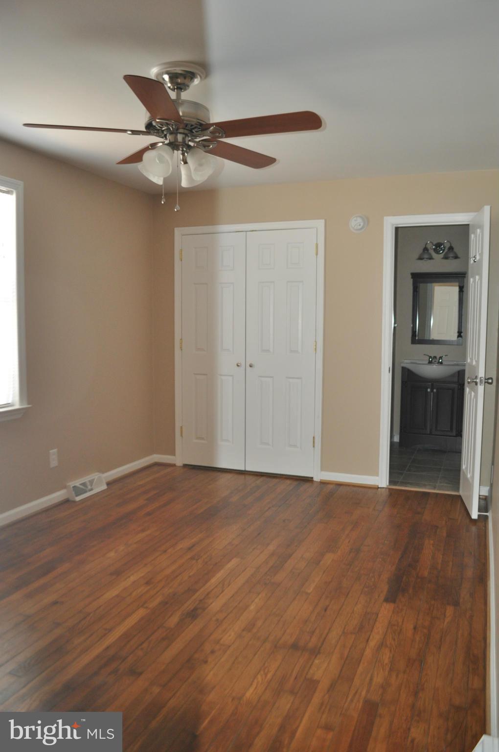 929 Woodlynn Road Baltimore, MD 21221 - Photo 14 of 25 a view of an empty room with a window