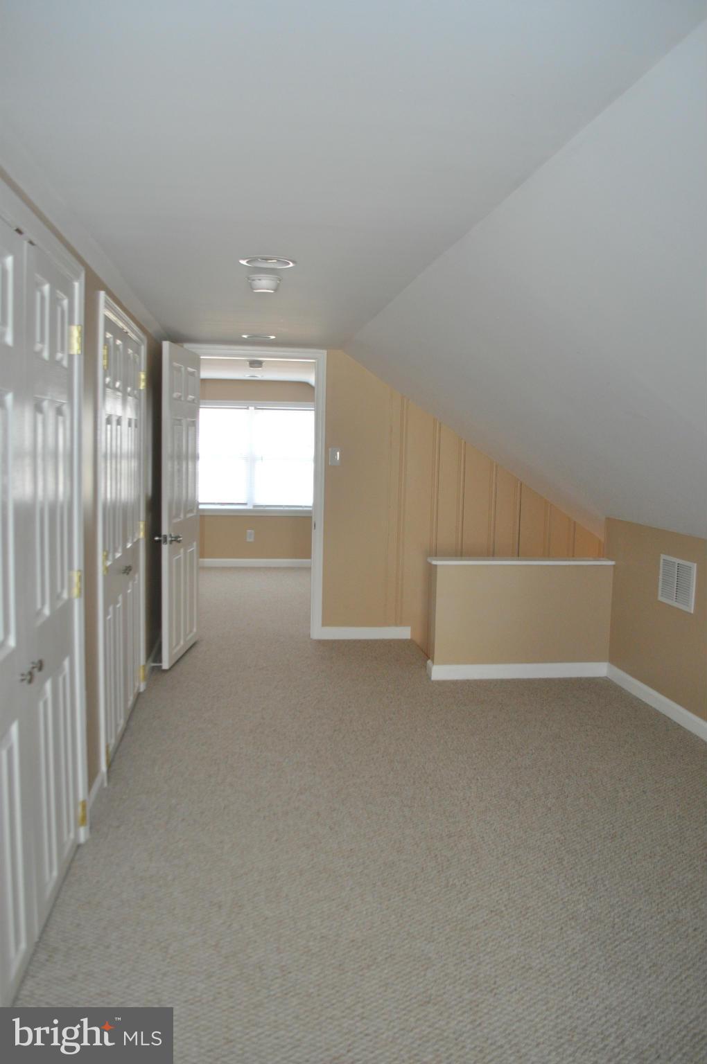929 Woodlynn Road Baltimore, MD 21221 - Photo 20 of 25 a view of an empty room with a window