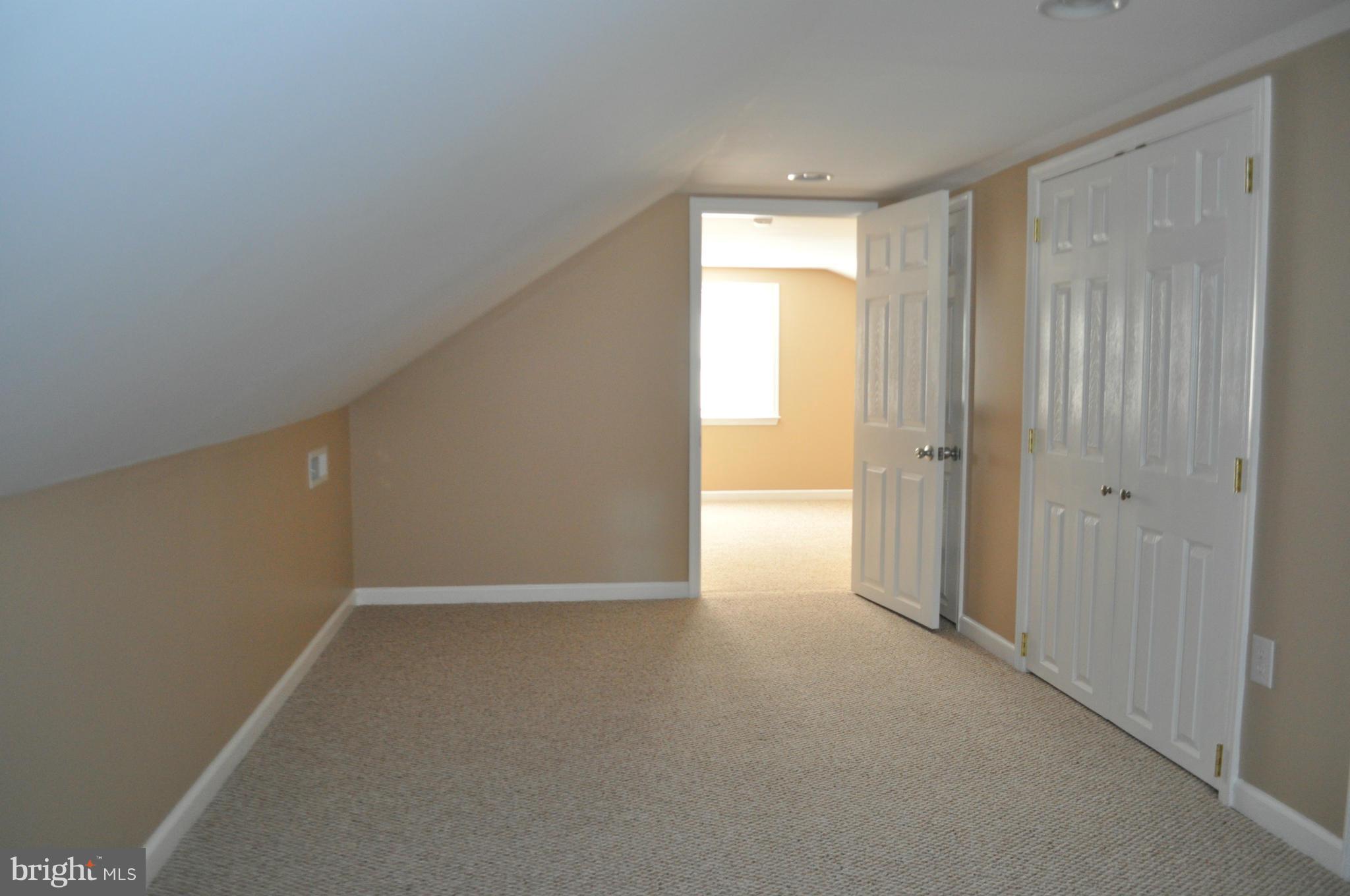 929 Woodlynn Road Baltimore, MD 21221 - Photo 24 of 25 a view of an empty room and a window