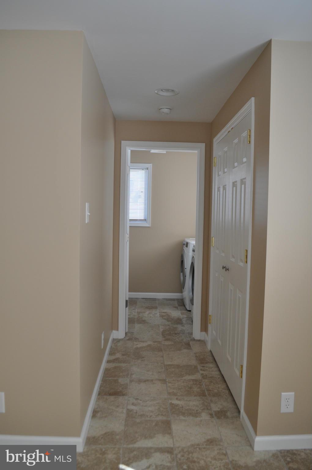 929 Woodlynn Road Baltimore, MD 21221 - Photo 8 of 25 a view of a hallway