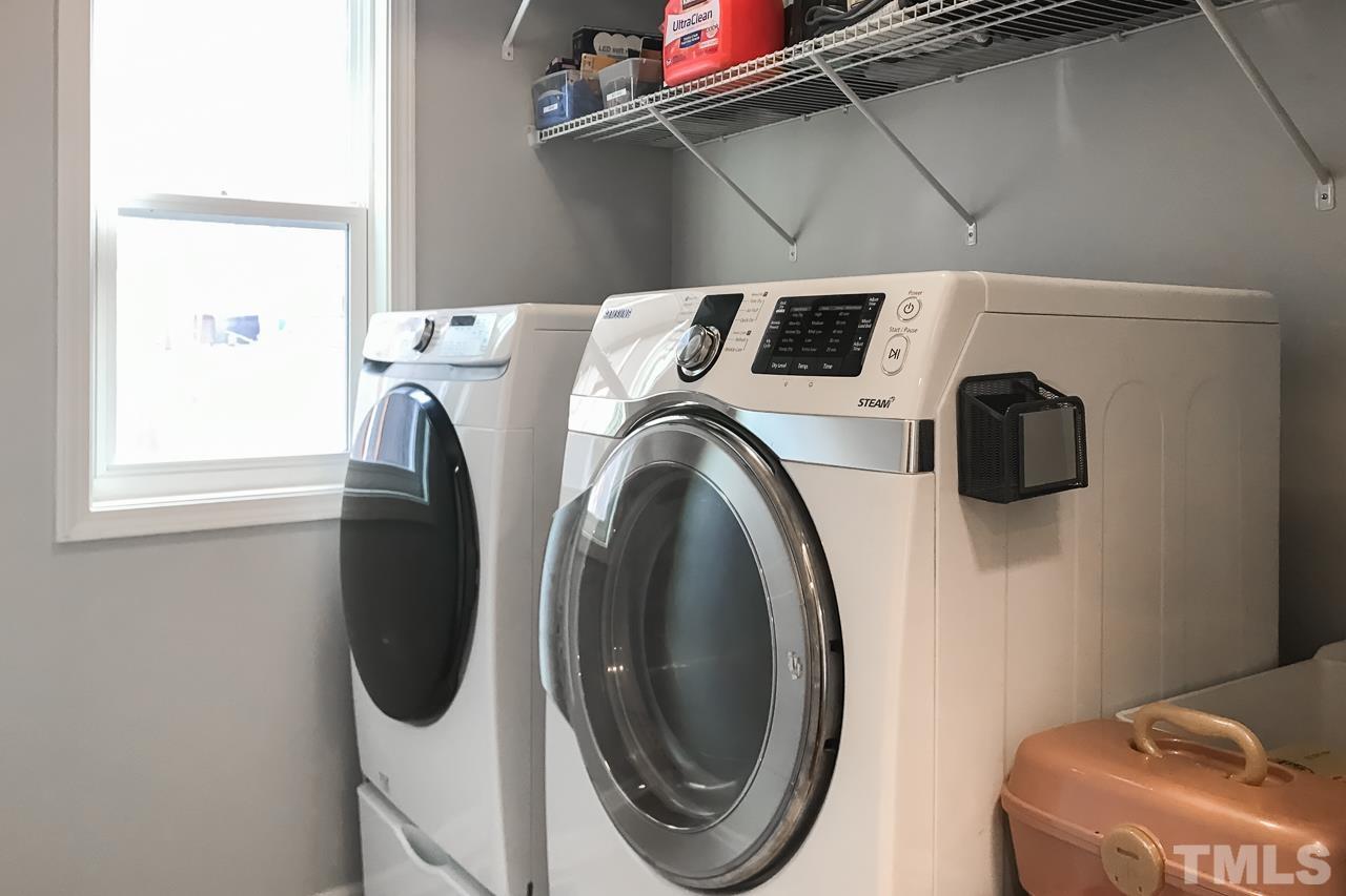 2901 Red Grape Drive Raleigh, NC 27607 - Photo 12 of 43 a utility room with dryer and washer