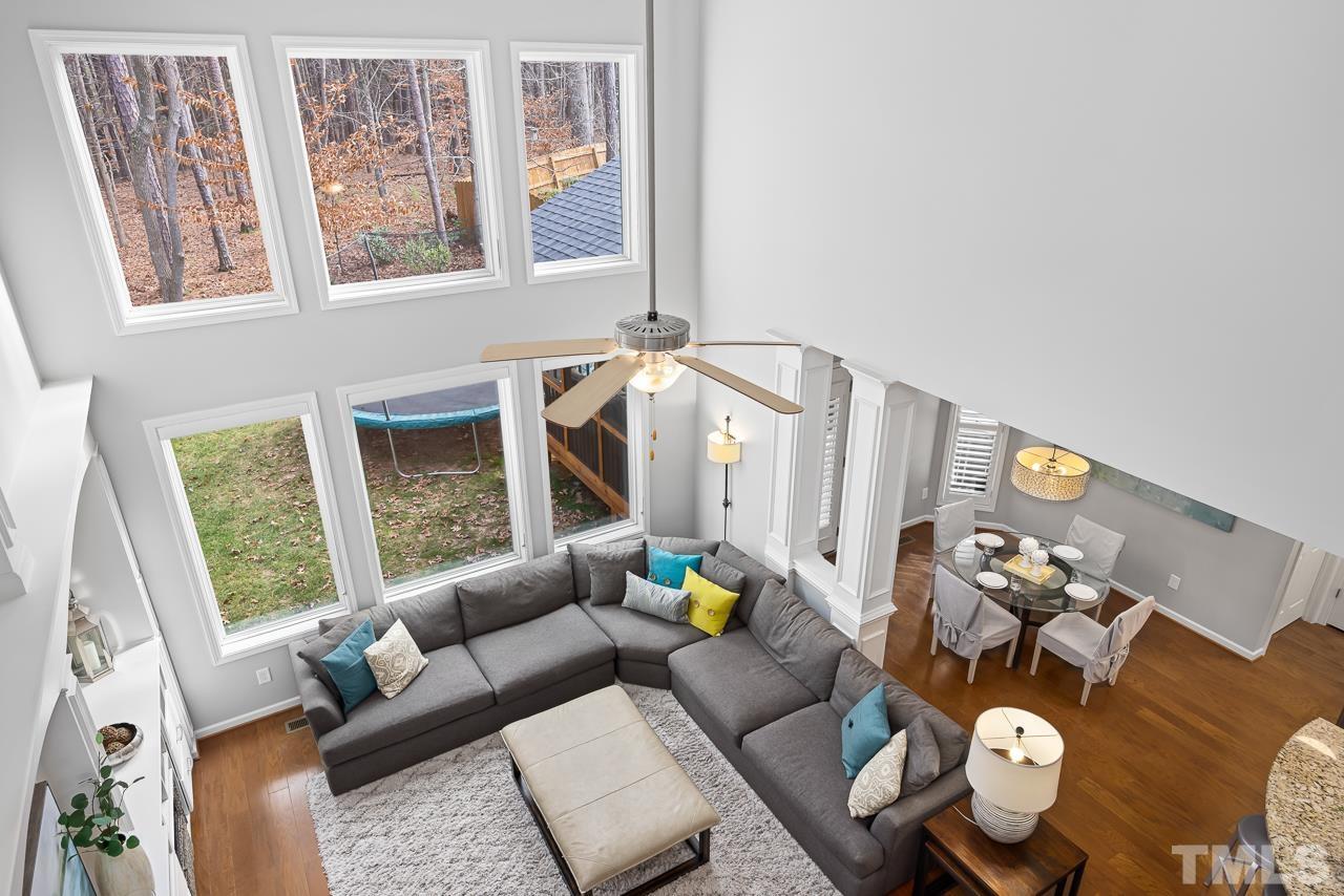 2901 Red Grape Drive Raleigh, NC 27607 - Photo 13 of 43 a living room with furniture and wooden floor