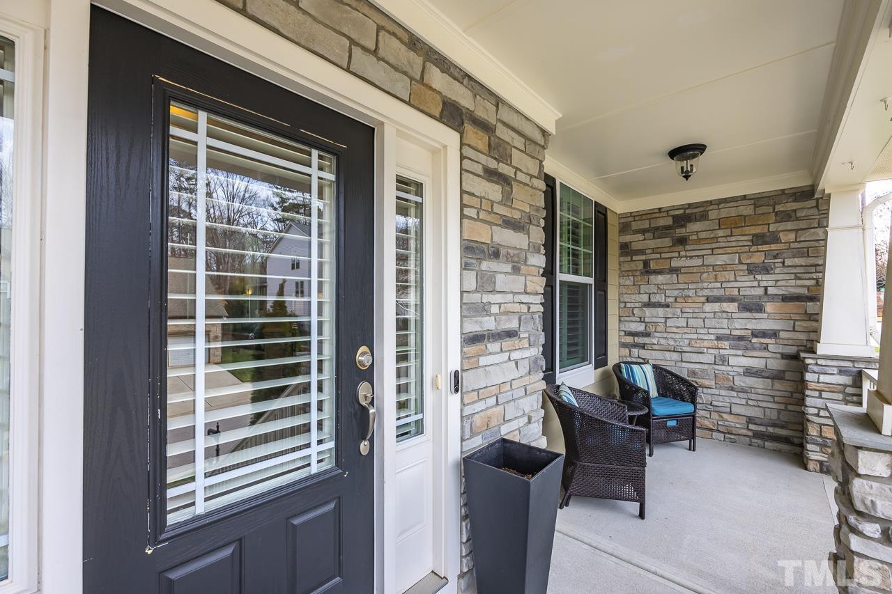 2901 Red Grape Drive Raleigh, NC 27607 - Photo 2 of 43 a backyard of a house with outdoor seating