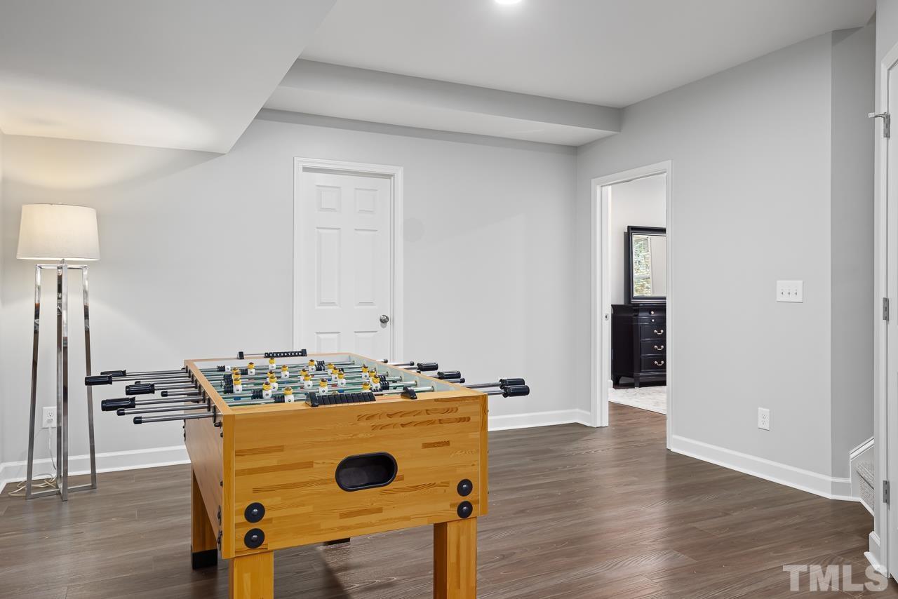 2901 Red Grape Drive Raleigh, NC 27607 - Photo 27 of 43 a view of kitchen island with wooden floor