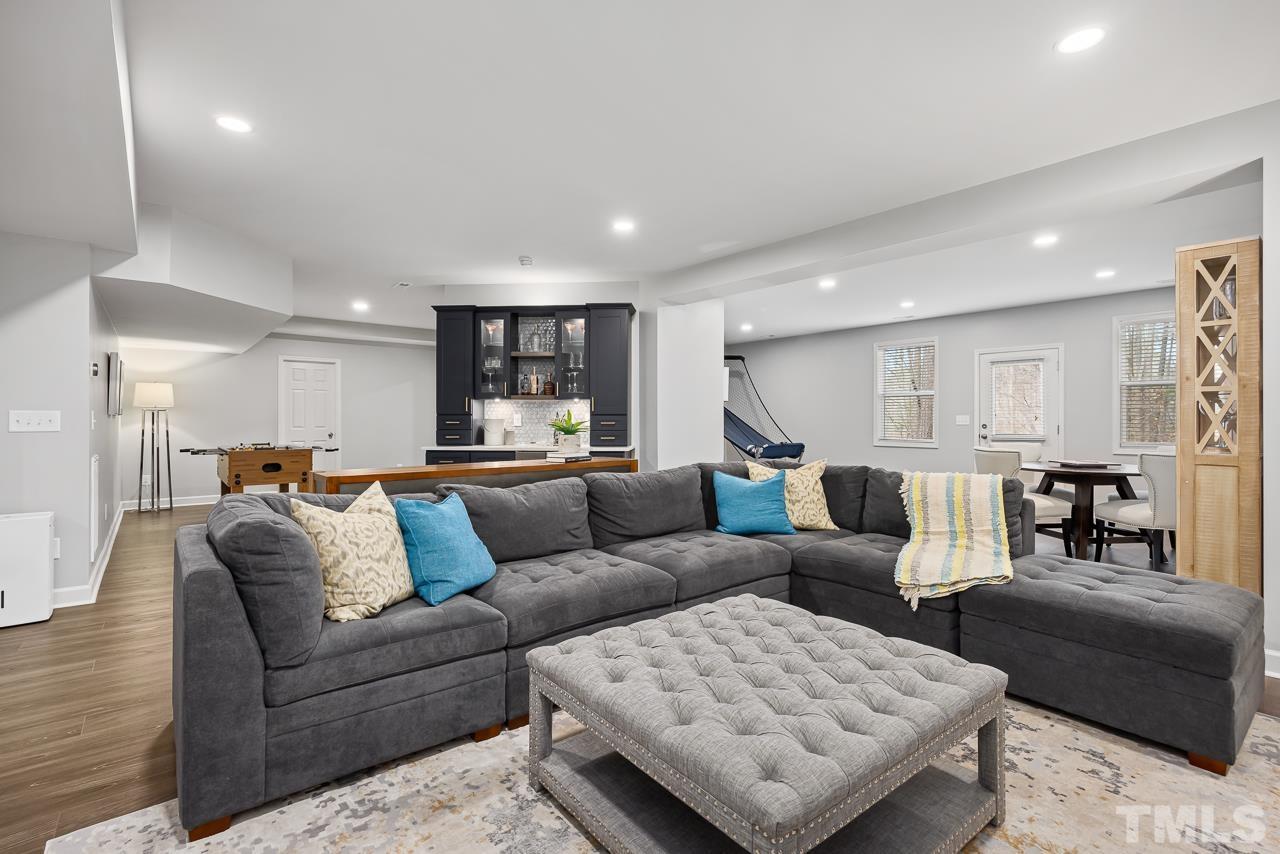 2901 Red Grape Drive Raleigh, NC 27607 - Photo 30 of 43 a living room with furniture and a couch