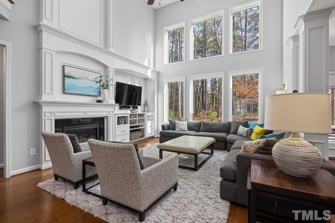 2901 Red Grape Drive Raleigh, NC 27607 - Photo 3 of 43 a living room with furniture and a fireplace
