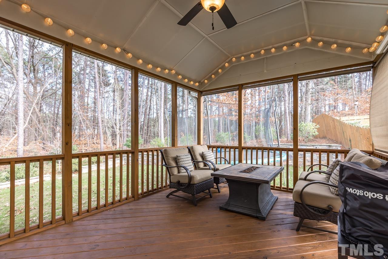 2901 Red Grape Drive Raleigh, NC 27607 - Photo 39 of 43 a balcony with furniture and wooden floor