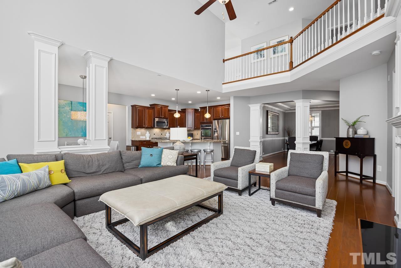 2901 Red Grape Drive Raleigh, NC 27607 - Photo 4 of 43 a living room with furniture and a wooden floor