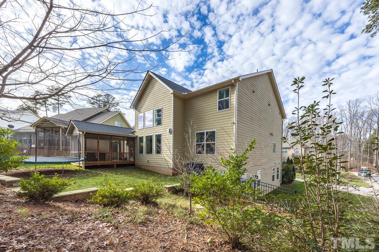 2901 Red Grape Drive Raleigh, NC 27607 - Photo 41 of 43 a front view of a house with garden