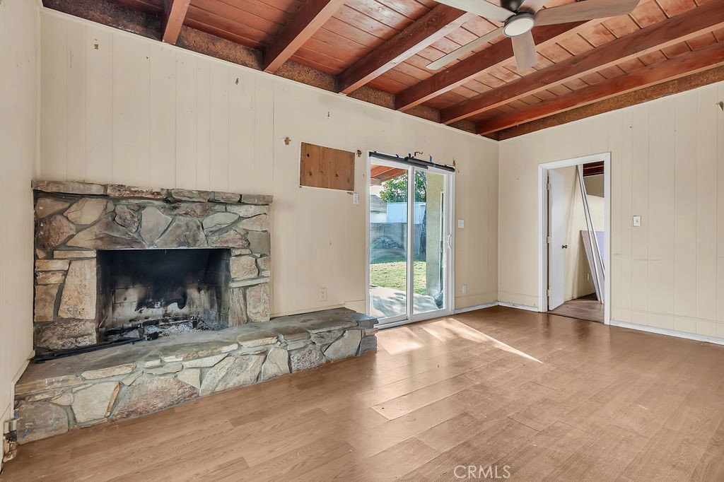 9734 Terradell Street Pico Rivera, CA 90660 - Photo 4 of 10 a view of livingroom with fireplace and window