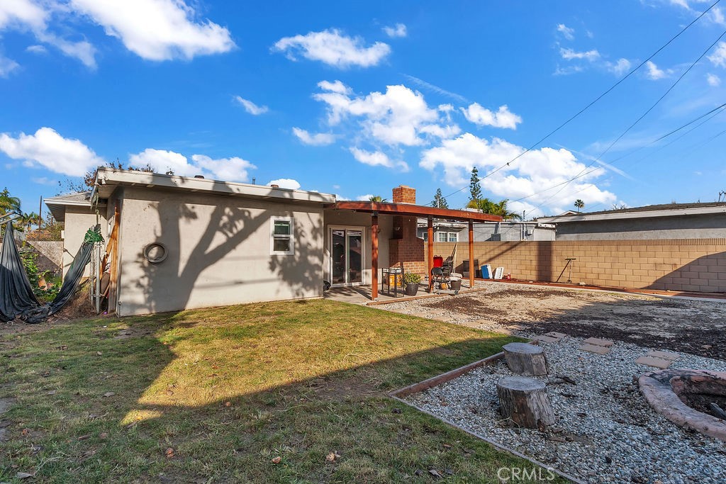 9734 Terradell Street Pico Rivera, CA 90660 - Photo 10 of 10 a view of a house with a yard