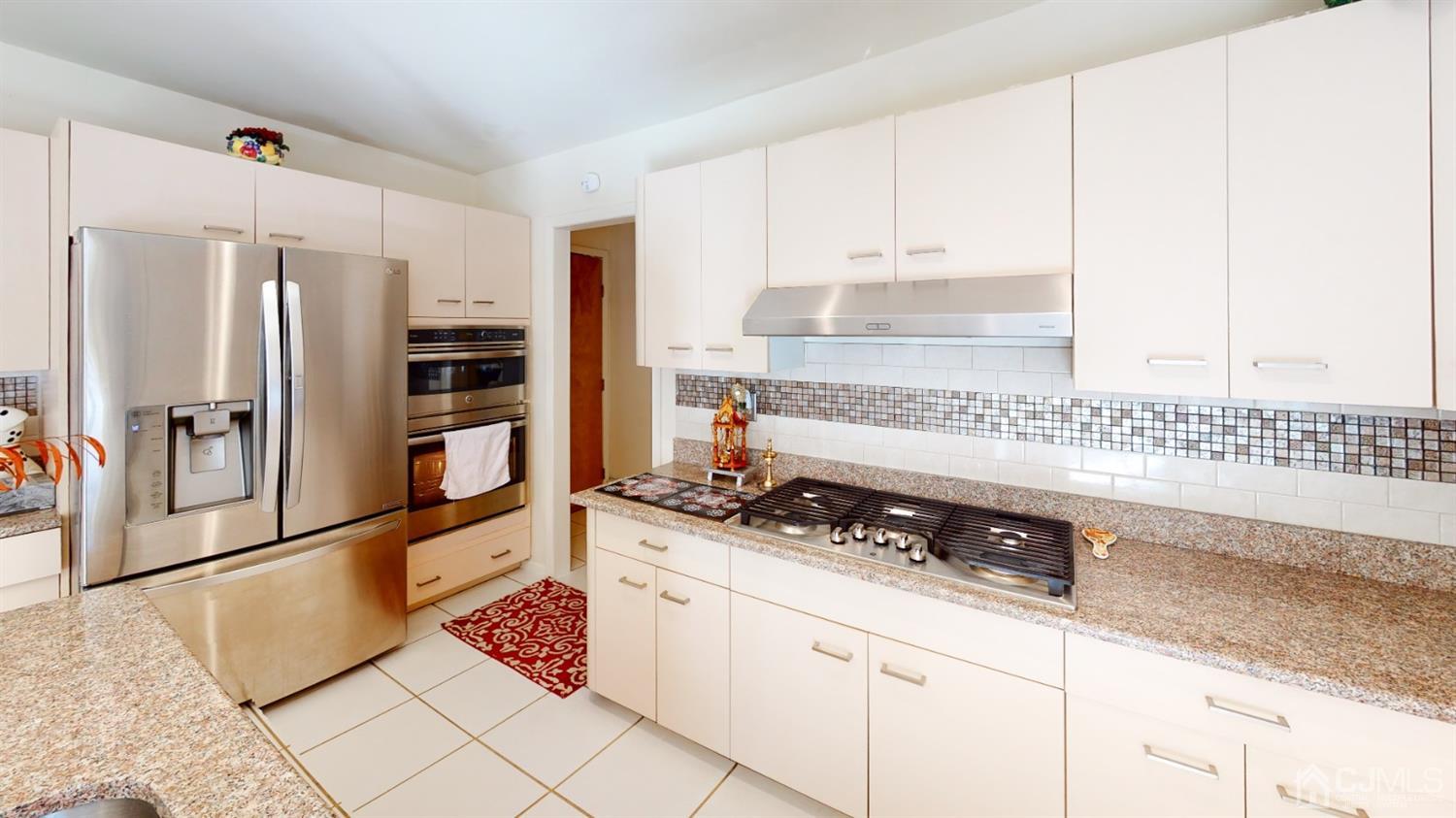 10 Cook Road East Brunswick, NJ 08816 - Photo 6 of 25 Granite Countertop Kitchen with Stainless Steel Appliances