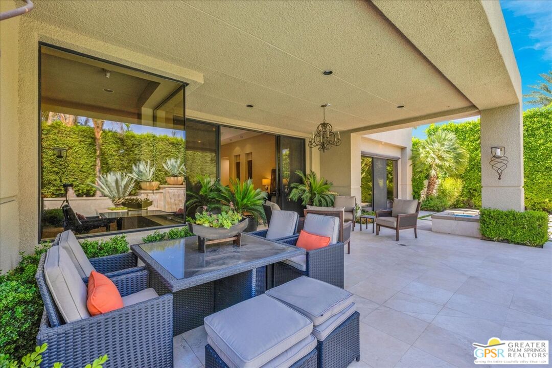 39700 Keenan Drive Rancho Mirage, CA 92270 - Photo 16 of 69 a view of an outdoor dining space with a table and chairs