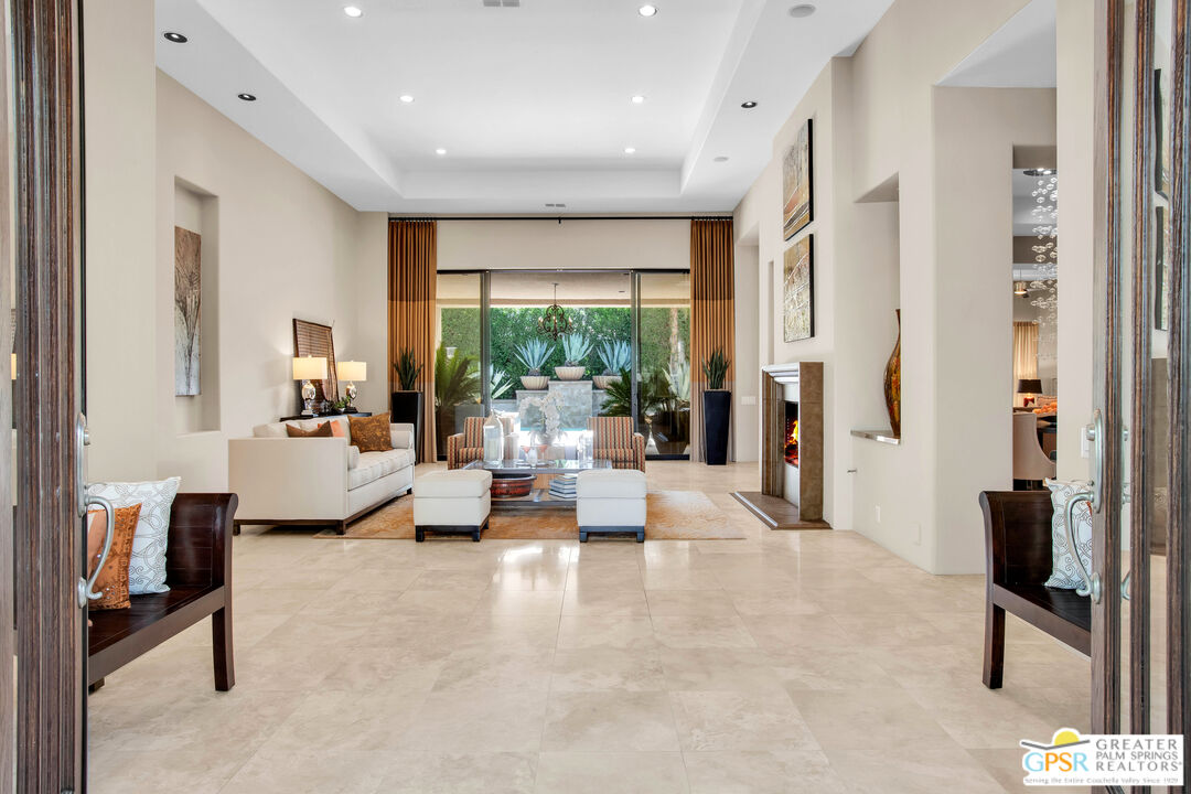 39700 Keenan Drive Rancho Mirage, CA 92270 - Photo 24 of 69 a living room with furniture and a flat screen tv