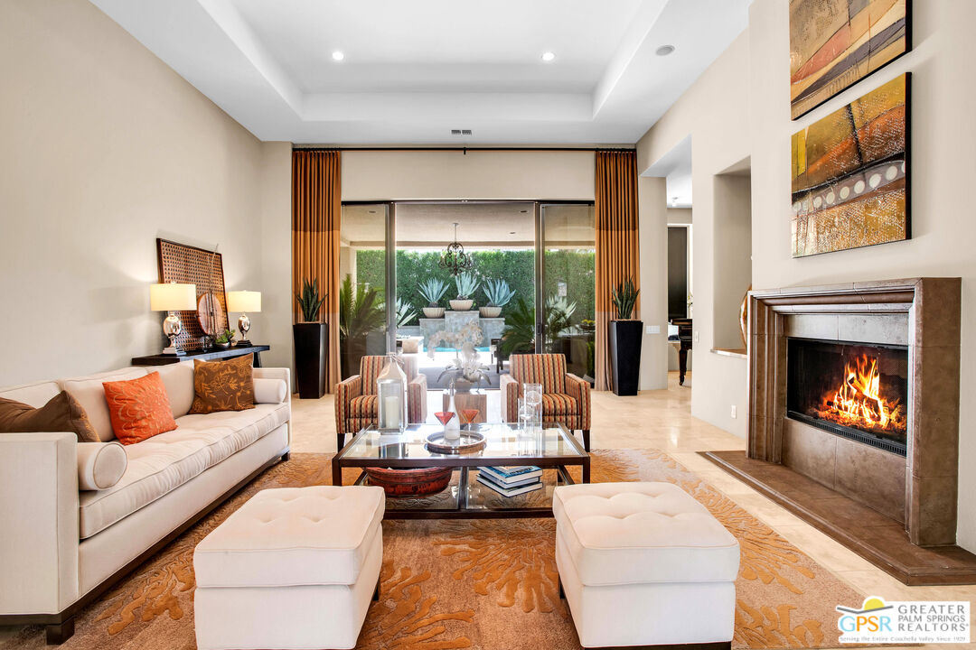39700 Keenan Drive Rancho Mirage, CA 92270 - Photo 25 of 69 a living room with furniture and a fireplace