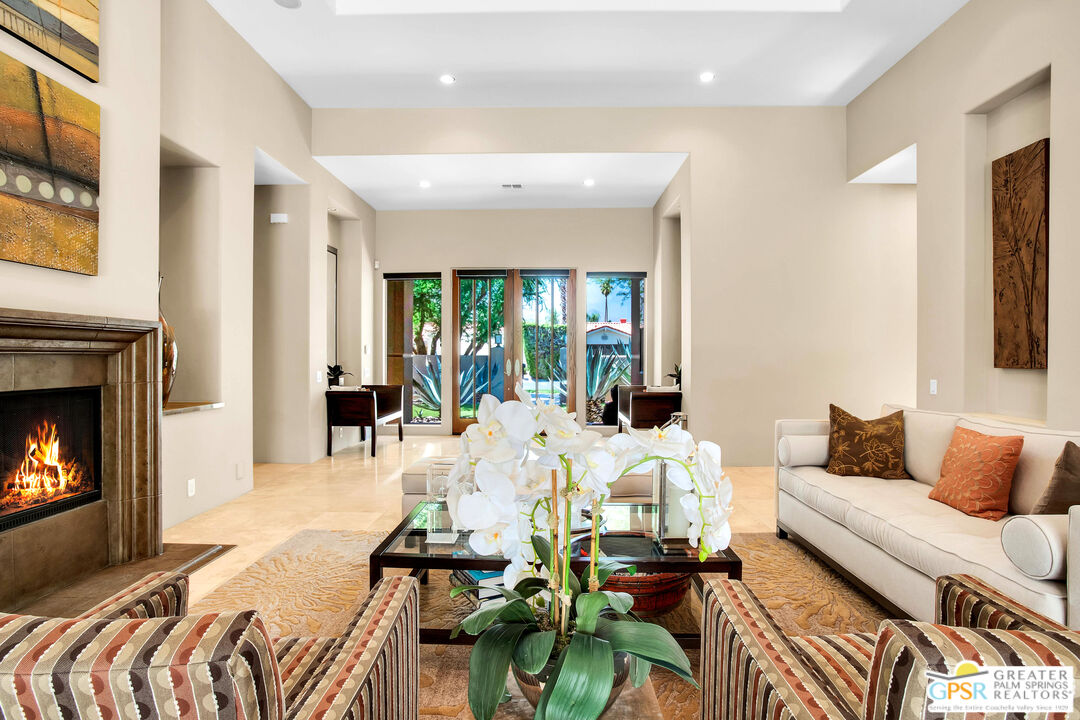 39700 Keenan Drive Rancho Mirage, CA 92270 - Photo 29 of 69 a living room with furniture fireplace and a fireplace