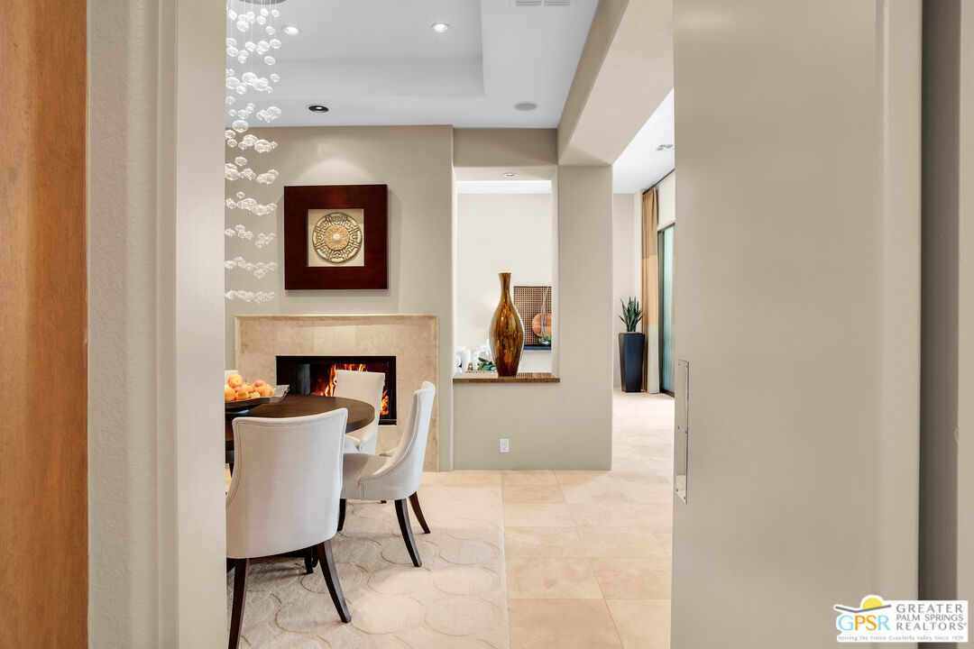 39700 Keenan Drive Rancho Mirage, CA 92270 - Photo 31 of 69 a view of a livingroom with furniture and a fireplace