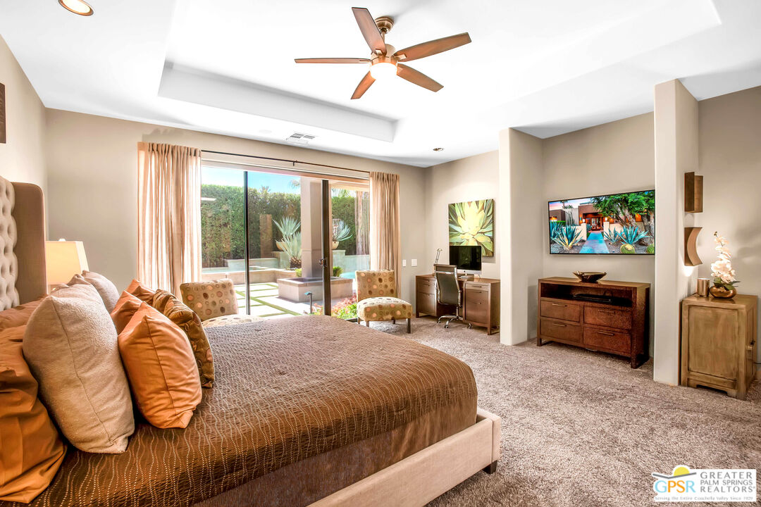 39700 Keenan Drive Rancho Mirage, CA 92270 - Photo 47 of 69 a bedroom with a bed and a couch