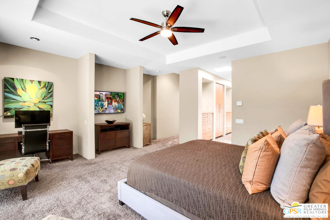 39700 Keenan Drive Rancho Mirage, CA 92270 - Photo 49 of 69 a bedroom with a bed and a flat screen tv