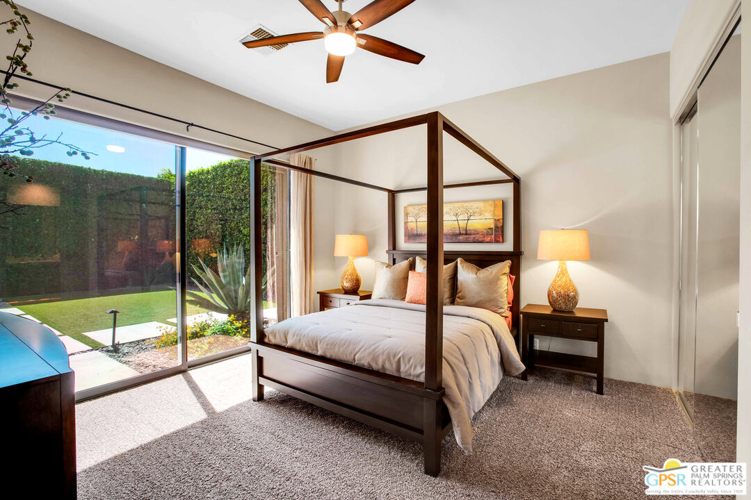 39700 Keenan Drive Rancho Mirage, CA 92270 - Photo 56 of 69 a bedroom with a bed and a view of balcony