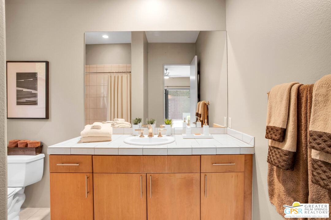 39700 Keenan Drive Rancho Mirage, CA 92270 - Photo 59 of 69 a bathroom with a sink and a mirror