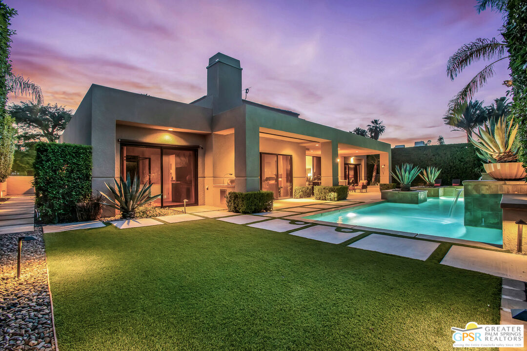 39700 Keenan Drive Rancho Mirage, CA 92270 - Photo 6 of 69 a front view of a house with swimming pool having outdoor seating