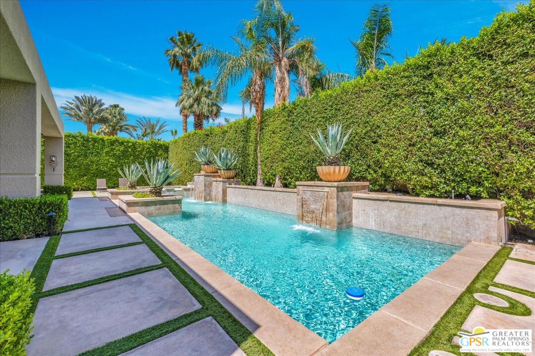 39700 Keenan Drive Rancho Mirage, CA 92270 - Photo 67 of 69 a view of a back yard with potted plants