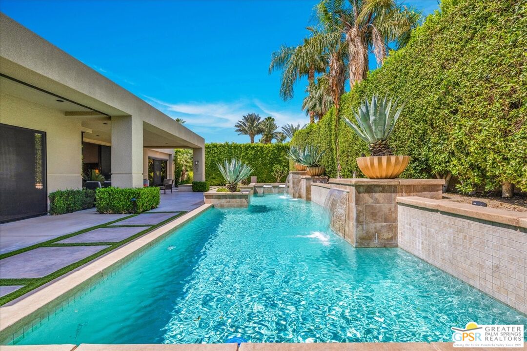 39700 Keenan Drive Rancho Mirage, CA 92270 - Photo 68 of 69 a view of a backyard with plants and a patio